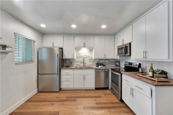 Interior, Kitchen, Recessed Lighting, Stainless Steel Appliances, Wood Texture Flooring