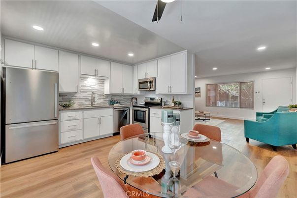 Dining room, Interior, Kitchen, Recessed Lighting, Stainless Steel Appliances, Wood Texture Flooring