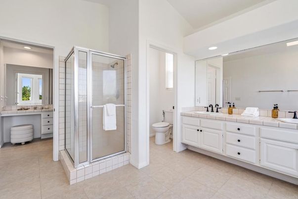 Bathroom, Dual Sink Vanities, Glass Shower, Interior, Recessed Lighting, Tile Countertops