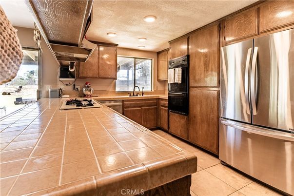 Interior, Kitchen, Recessed Lighting, Stainless Steel Appliances, Tile Countertops