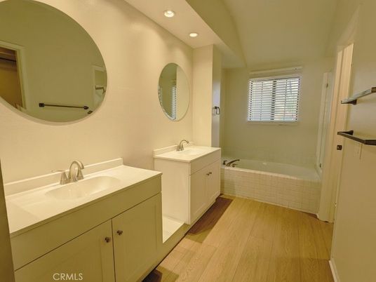 Bathroom, Dual Sink Vanities, Interior, Recessed Lighting, Wood Texture Flooring