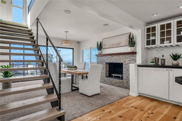 Dining room, Fireplace, Interior, Pendant Lights, Recessed Lighting, Wood Texture Flooring