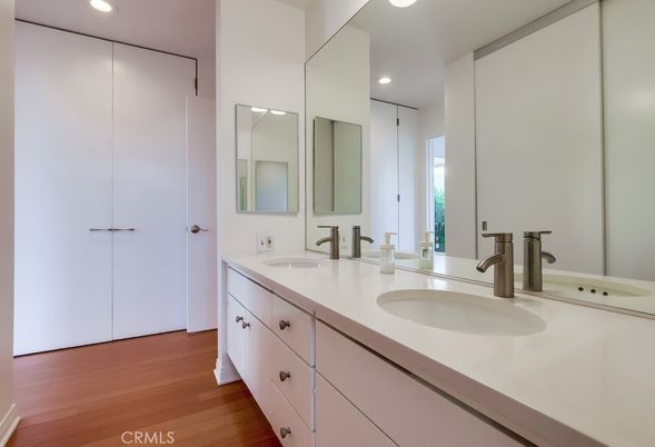 Bathroom, Dual Sink Vanities, Interior, Recessed Lighting, Wood Texture Flooring