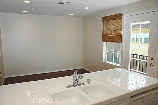 Bathroom, Interior, Recessed Lighting, Tile Countertops, Wood Texture Flooring