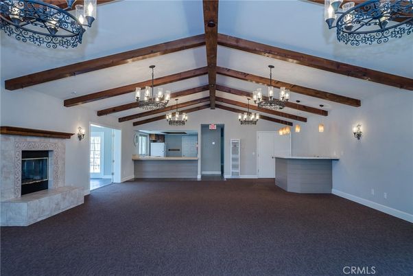 Chandelier, Empty room, Fireplace, Interior, Pendant Lights, Wooden Beams