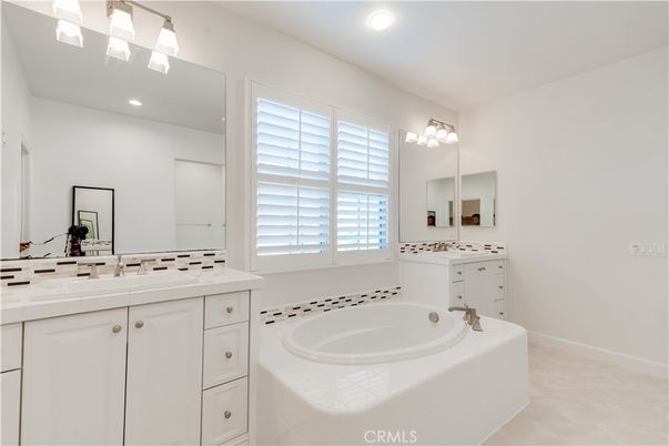 Bathroom, Dual Sink Vanities, Interior, Recessed Lighting, Tile Countertops