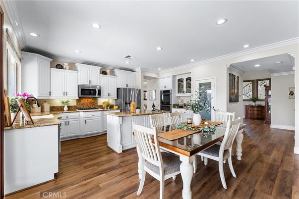 Dining room, Interior, Kitchen, Recessed Lighting, Stainless Steel Appliances, Wood Texture Flooring