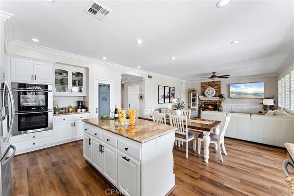 Dining room, Fireplace, Interior, Kitchen, Living room, Recessed Lighting, Wood Texture Flooring
