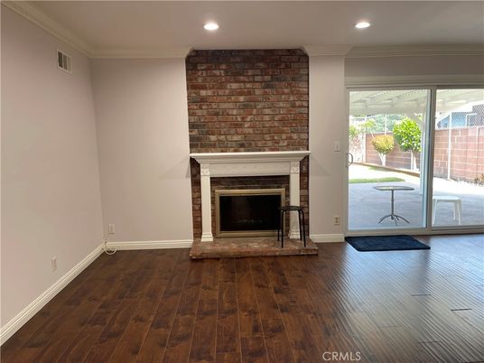 Fireplace, Interior, Recessed Lighting, Stone Walls, Wood Texture Flooring