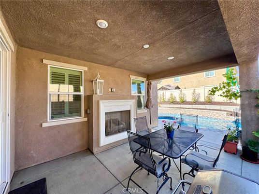 Exterior, Fireplace, Pool