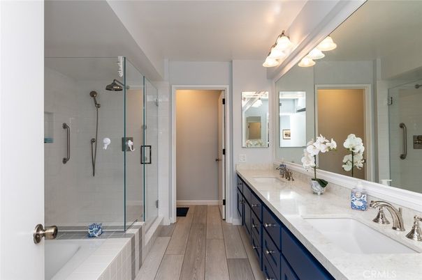 Bathroom, Dual Sink Vanities, Glass Shower, Interior, Wood Texture Flooring