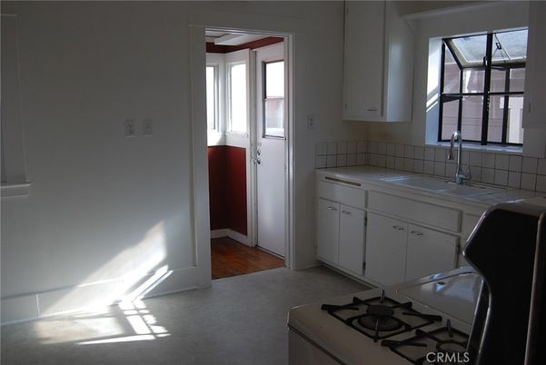 Interior, Kitchen, Tile Countertops, Wood Texture Flooring