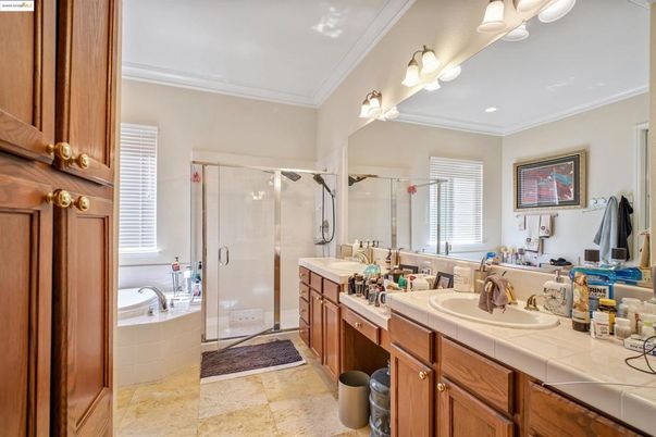 Bathroom, Dual Sink Vanities, Glass Shower, Interior, Recessed Lighting, Tile Countertops