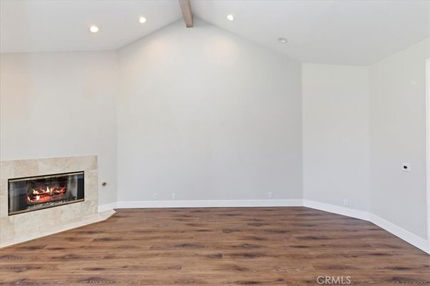 Empty room, Fireplace, Interior, Recessed Lighting, Wooden Beams, Wood Texture Flooring