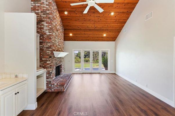 Empty room, Fireplace, Interior, Recessed Lighting, Wooden Ceilings, Wood Texture Flooring
