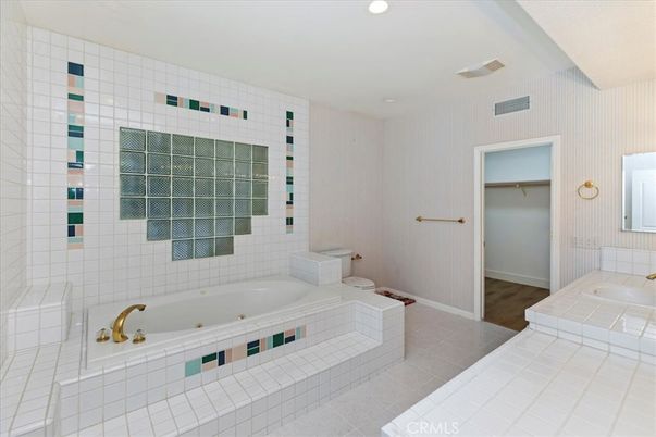 Bathroom, Interior, Recessed Lighting, Tile Countertops, Wood Texture Flooring