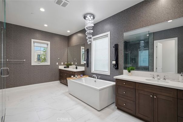 Bathroom, Chandelier, Dual Sink Vanities, Free Standing Baths, Interior, Marble, Pendant Lights, Recessed Lighting