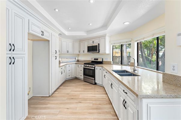 Interior, Kitchen, Recessed Lighting, Stainless Steel Appliances, Wood Texture Flooring