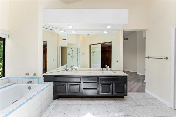 Bathroom, Dual Sink Vanities, Interior, Recessed Lighting, Wood Texture Flooring