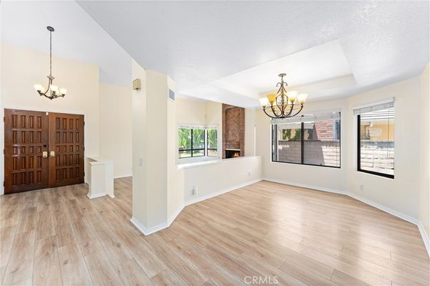 Chandelier, Empty room, Fireplace, Interior, Wood Texture Flooring