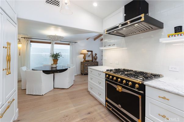 Dining room, Interior, Kitchen, Recessed Lighting, Stainless Steel Appliances, Water, Wood Texture Flooring