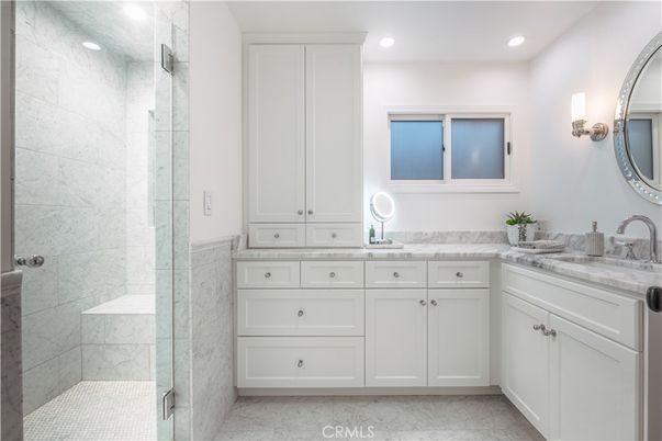 Bathroom, Dual Sink Vanities, Glass Shower, Interior, Marble, Marble Walls, Recessed Lighting