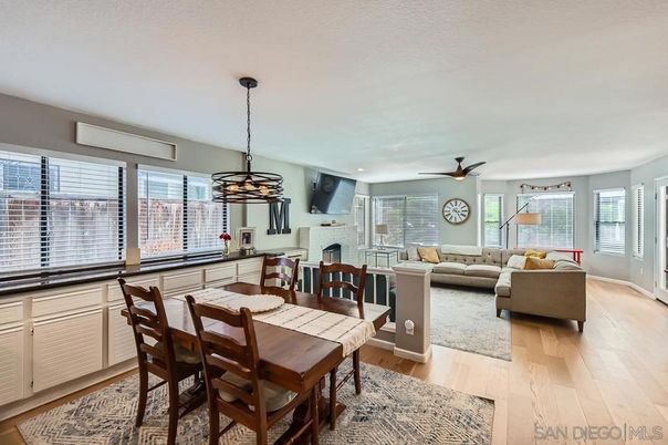 Dining room, Fireplace, Interior, Living room, Pendant Lights, Recessed Lighting, Stone Walls, Wood Texture Flooring