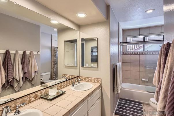 Bathroom, Dual Sink Vanities, Interior, Recessed Lighting, Tile Countertops