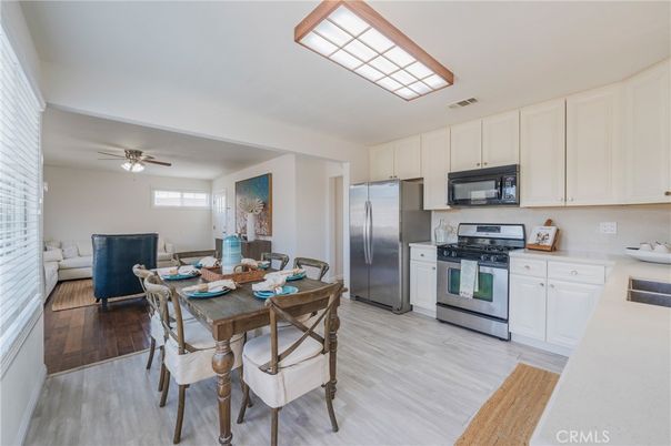 Dining room, Interior, Kitchen, Living room, Stainless Steel Appliances, Wood Texture Flooring