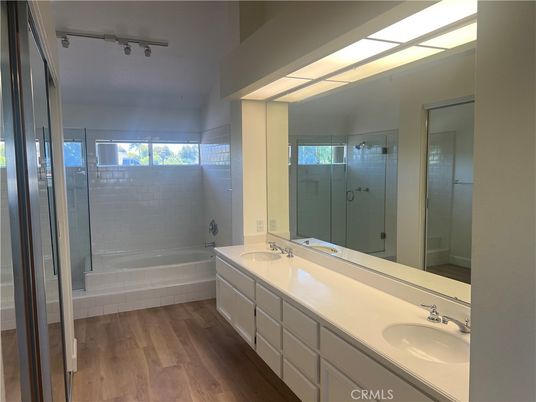 Bathroom, Dual Sink Vanities, Glass Shower, Interior, Wood Texture Flooring