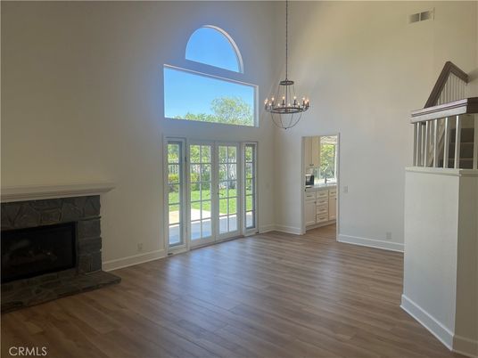 Chandelier, Empty room, Fireplace, Interior, Pendant Lights, Wood Texture Flooring