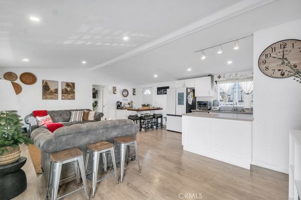 Dining room, Interior, Kitchen, Living room, Recessed Lighting, Stainless Steel Appliances, Wood Texture Flooring