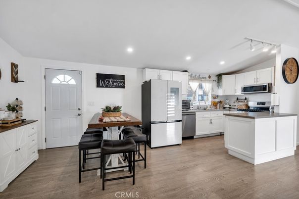 Dining room, Interior, Kitchen, Recessed Lighting, Stainless Steel Appliances, Wood Texture Flooring