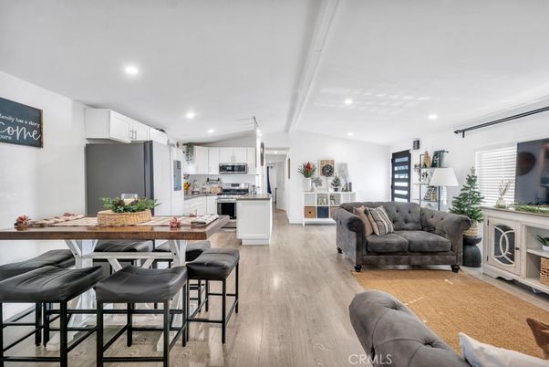 Dining room, Interior, Kitchen, Living room, Recessed Lighting, Stainless Steel Appliances, Wood Texture Flooring