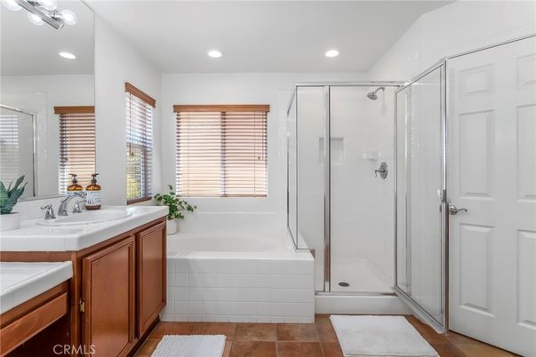 Bathroom, Dual Sink Vanities, Glass Shower, Interior, Recessed Lighting, Tile Countertops