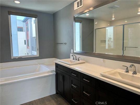 Bathroom, Dual Sink Vanities, Interior, Recessed Lighting, Wood Texture Flooring