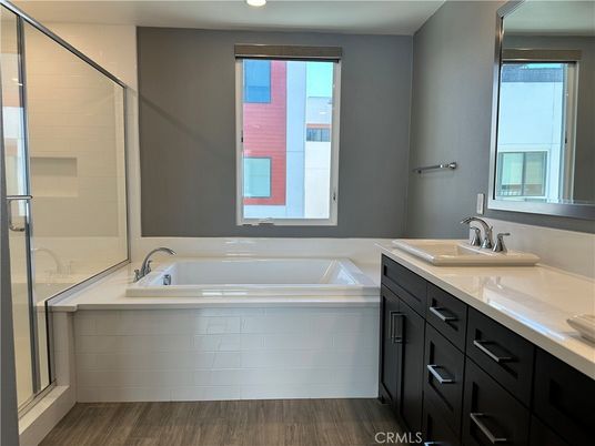 Bathroom, Dual Sink Vanities, Interior, Recessed Lighting, Wood Texture Flooring