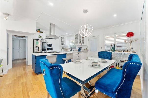 Dining room, Interior, Kitchen, Pendant Lights, Recessed Lighting, Stainless Steel Appliances, Wood Texture Flooring