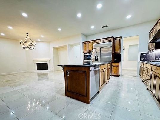 Fireplace, Interior, Kitchen, Pendant Lights, Recessed Lighting, Stainless Steel Appliances
