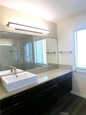 Bathroom, Dual Sink Vanities, Glass Shower, Interior, Wood Texture Flooring
