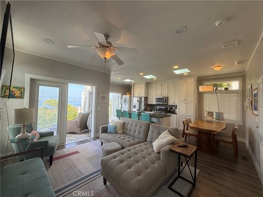 Dining room, Interior, Kitchen, Living room, Recessed Lighting, Stainless Steel Appliances, Wood Texture Flooring