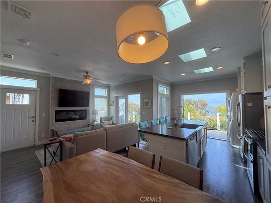 Dining room, Fireplace, Interior, Kitchen, Living room, Recessed Lighting, Wood Texture Flooring