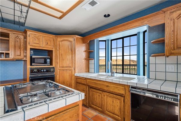 Interior, Kitchen, Recessed Lighting, Tile Countertops