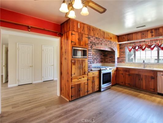 Interior, Kitchen, Stainless Steel Appliances, Stone Walls, Wood Texture Flooring