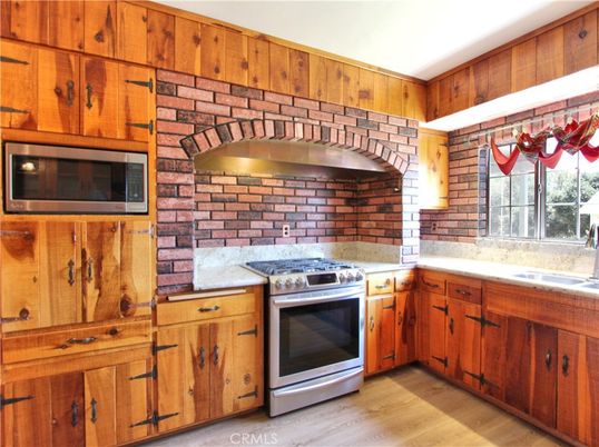 Interior, Kitchen, Stainless Steel Appliances, Stone Walls, Wood Texture Flooring