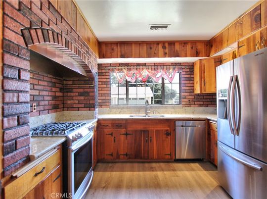 Interior, Kitchen, Stainless Steel Appliances, Stone Walls, Wood Texture Flooring