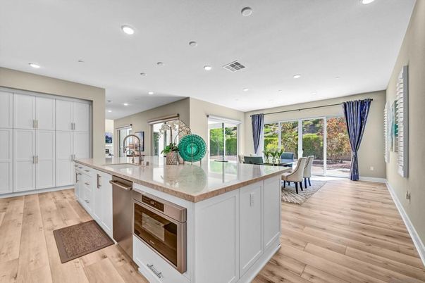 Dining room, Interior, Kitchen, Recessed Lighting, Stainless Steel Appliances, Wood Texture Flooring
