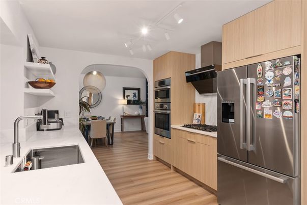 Dining room, Interior, Kitchen, Recessed Lighting, Stainless Steel Appliances, Wood Texture Flooring