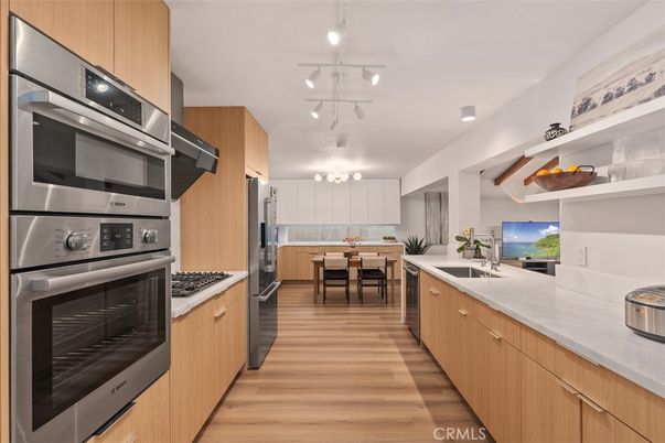 Dining room, Interior, Kitchen, Recessed Lighting, Stainless Steel Appliances, Wood Texture Flooring