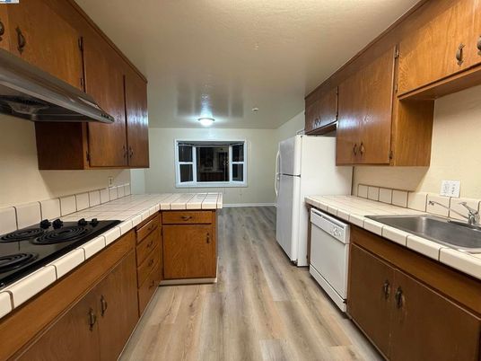 Interior, Kitchen, Tile Countertops, Wood Texture Flooring